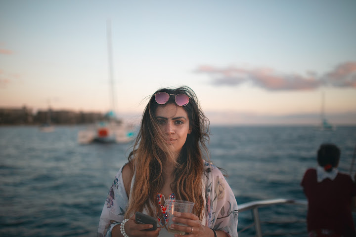 Portrait beside the water at dusk