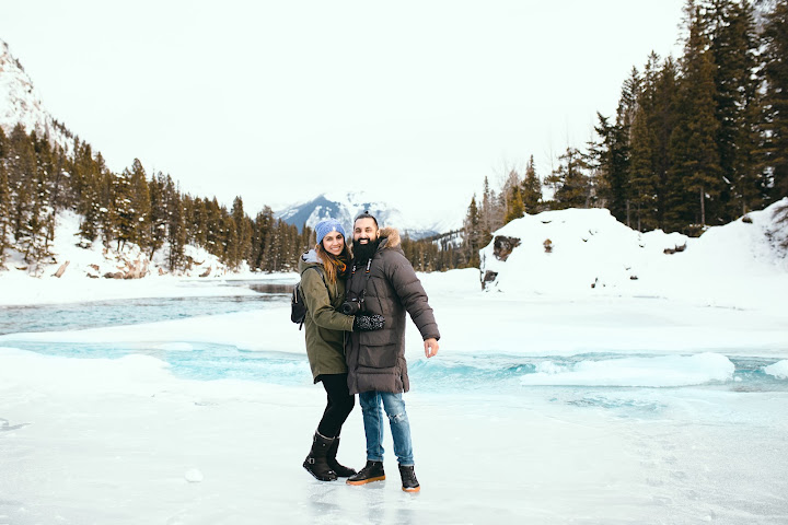 Couple embracing on a frozen lake