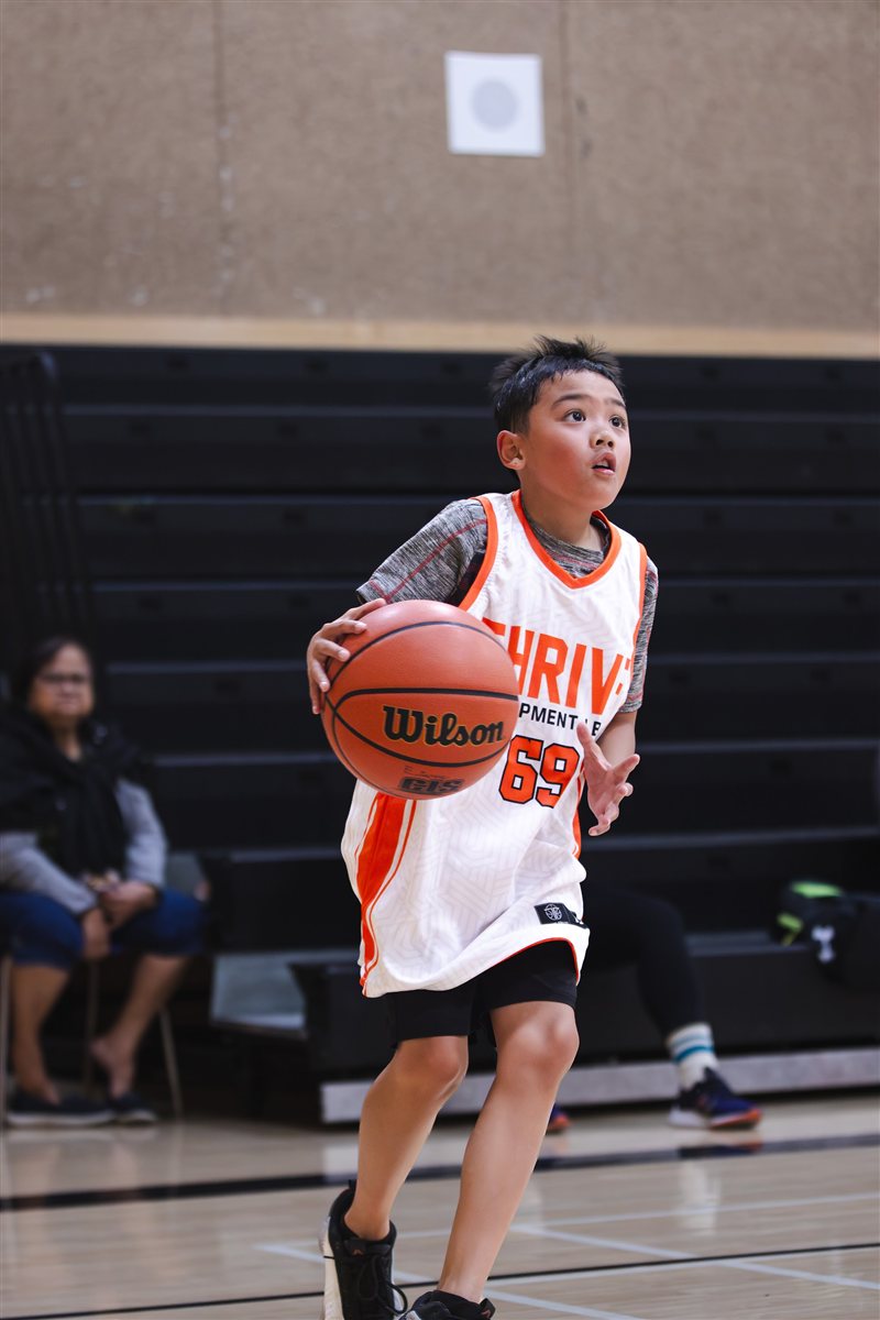 Basketball player running with the ball